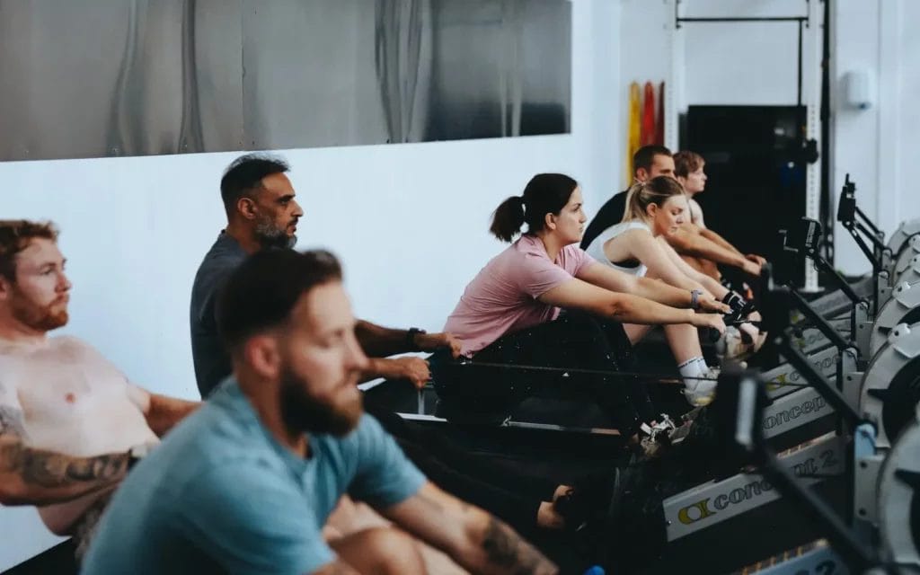 Hyrox working out rowing